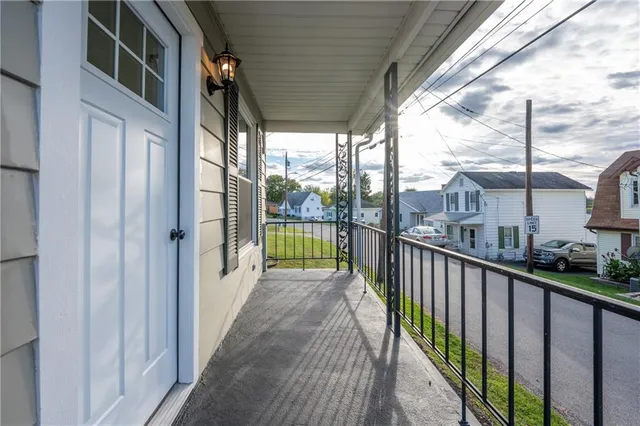 a view of a street from a balcony