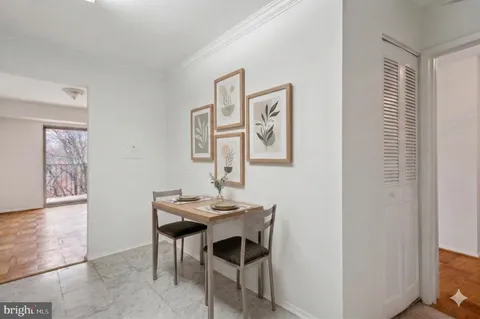 a view of a dining room with furniture