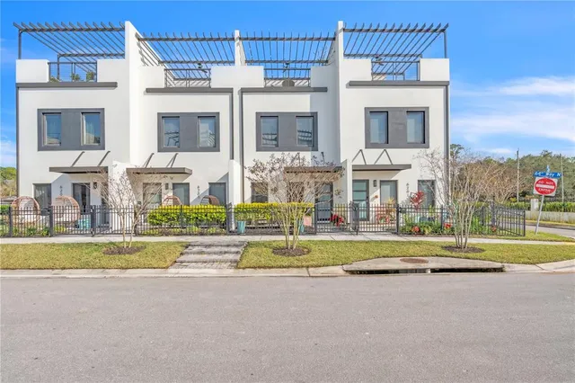 a front view of a house with a swimming pool