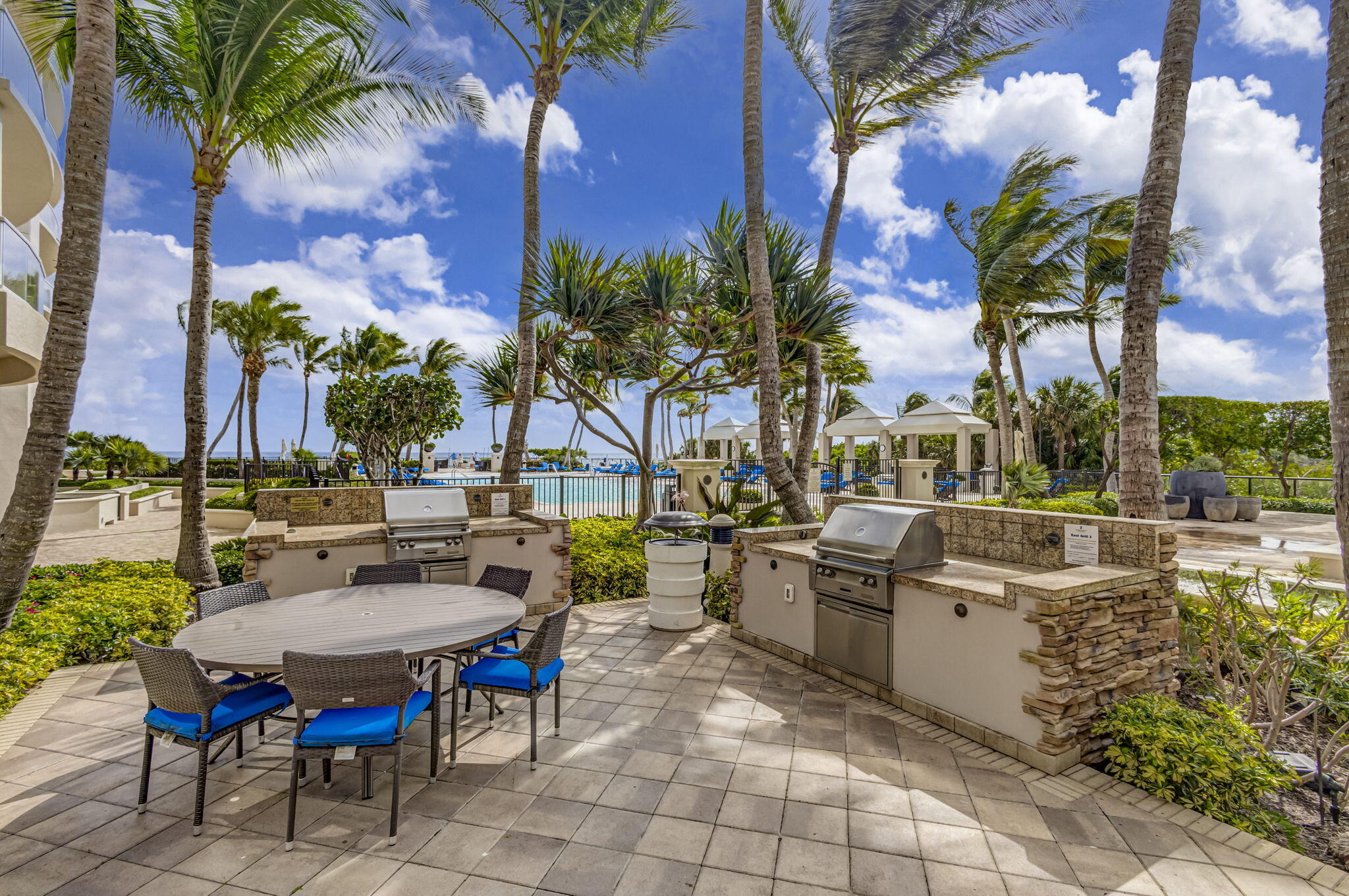 2700 North Ocean Drive, Unit 1401A Riviera Beach, FL 33404 - Photo 104 of 116 a view of a patio with chairs and tables