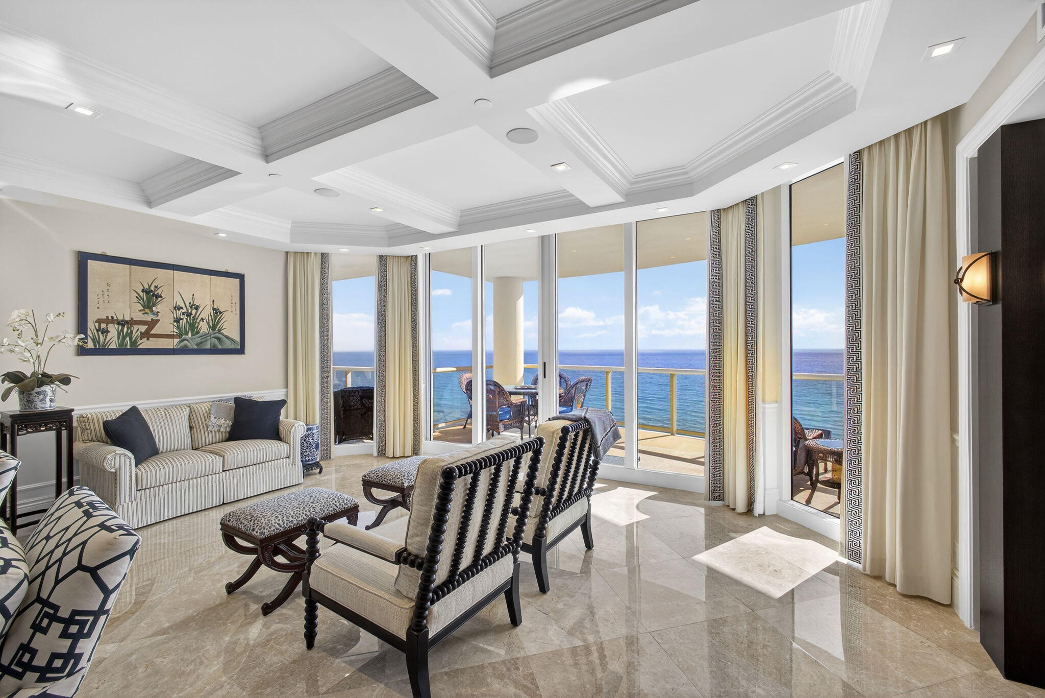 2700 North Ocean Drive, Unit 1401A Riviera Beach, FL 33404 - Photo 13 of 116 a living room with furniture and a floor to ceiling window