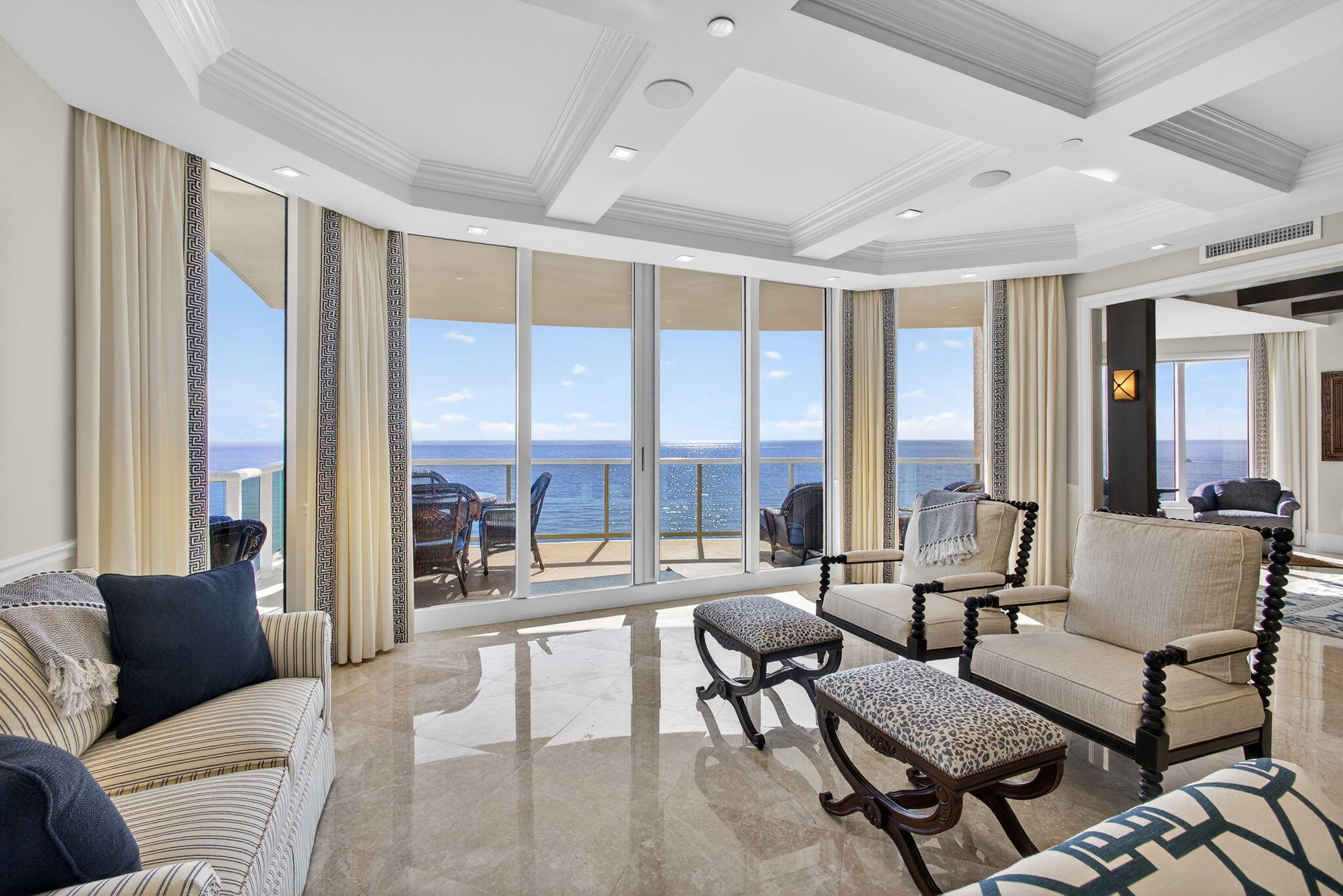 2700 North Ocean Drive, Unit 1401A Riviera Beach, FL 33404 - Photo 15 of 116 a living room with furniture and a large window