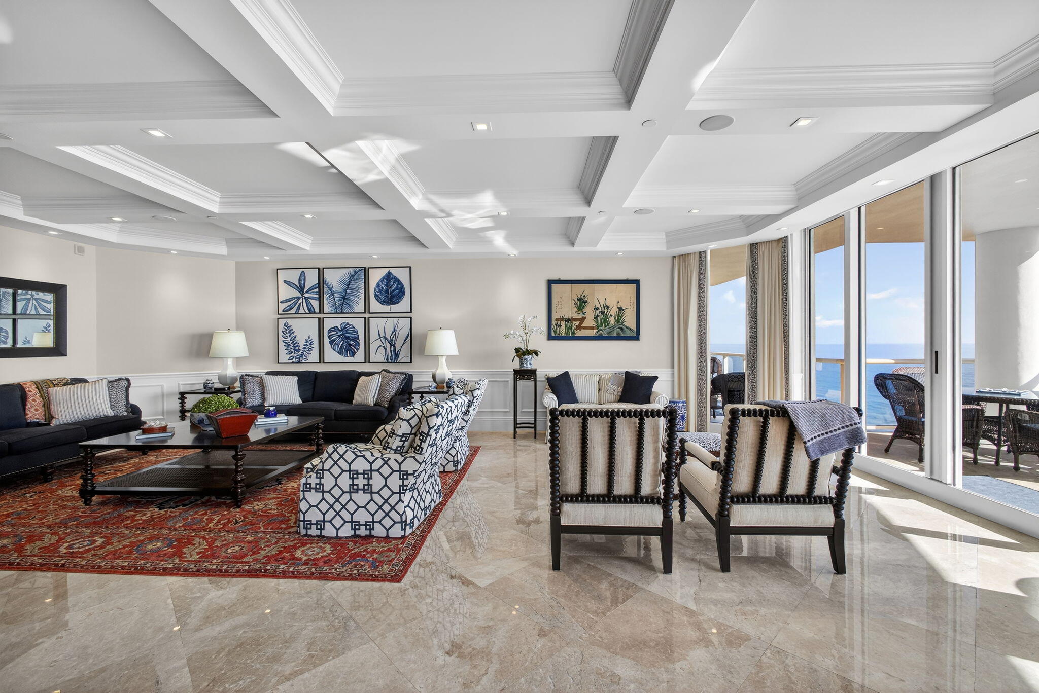 2700 North Ocean Drive, Unit 1401A Riviera Beach, FL 33404 - Photo 19 of 116 a living room with furniture and a large window