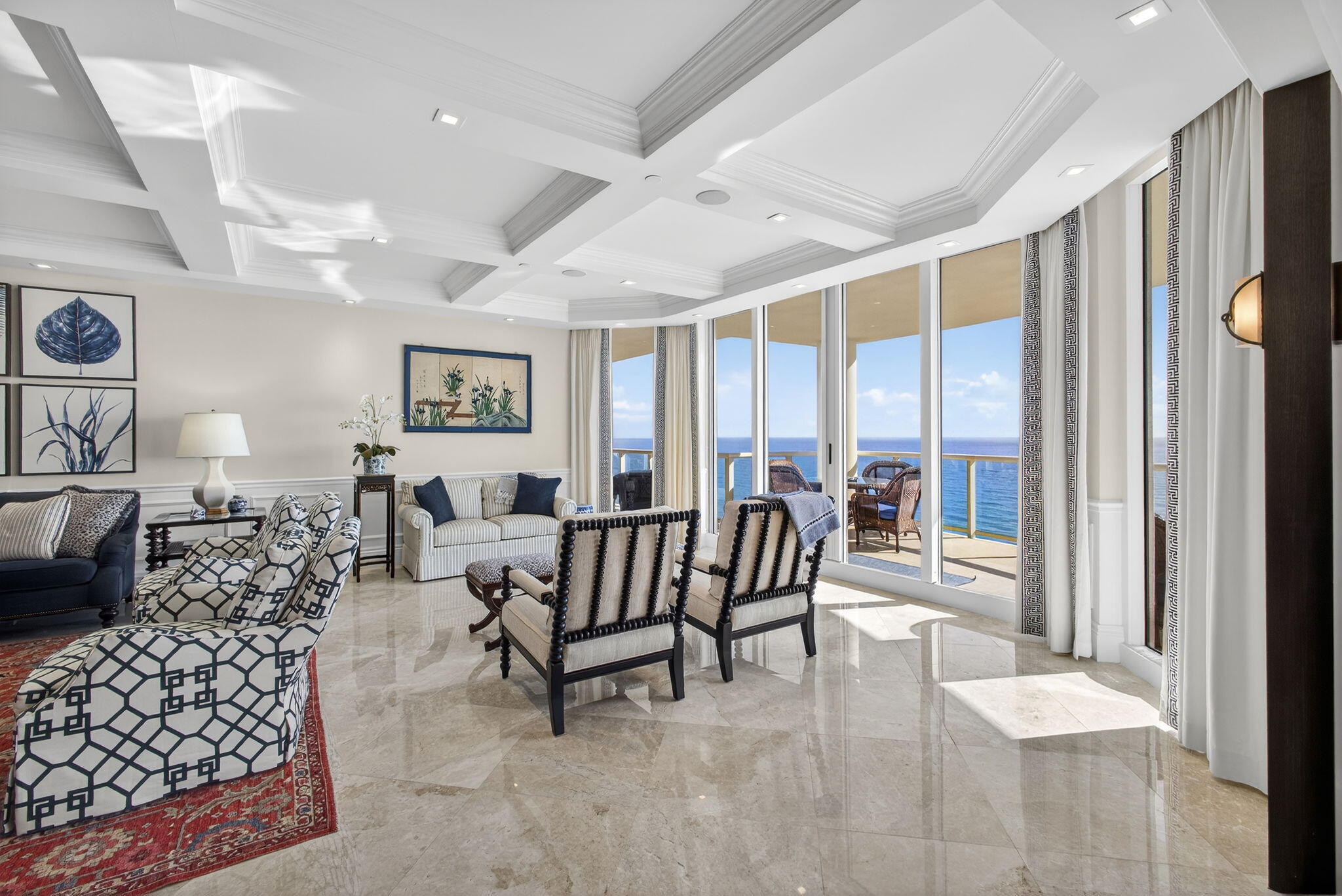2700 North Ocean Drive, Unit 1401A Riviera Beach, FL 33404 - Photo 20 of 116 a living room with furniture and a large window