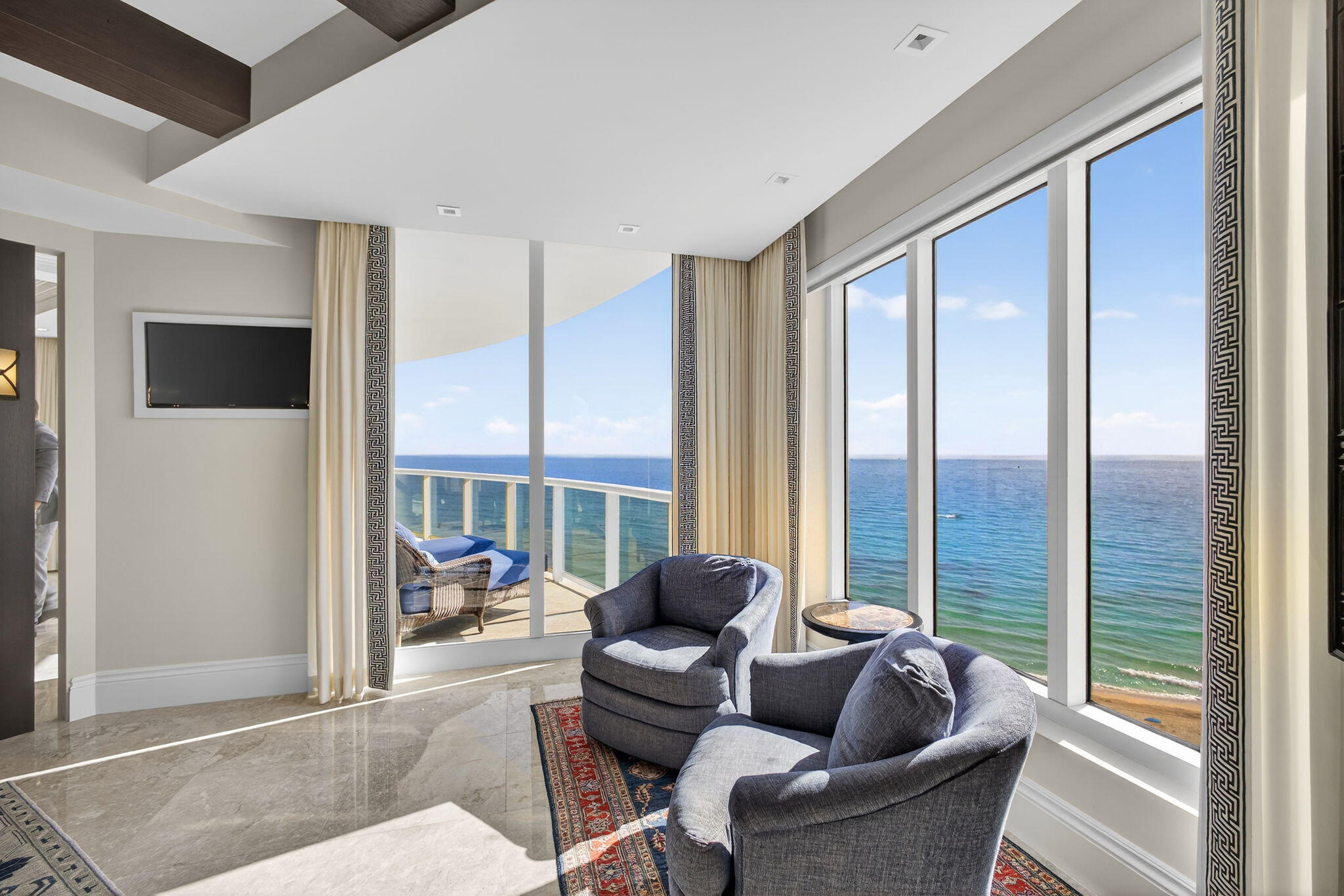 2700 North Ocean Drive, Unit 1401A Riviera Beach, FL 33404 - Photo 26 of 116 a living room with furniture and a floor to ceiling window