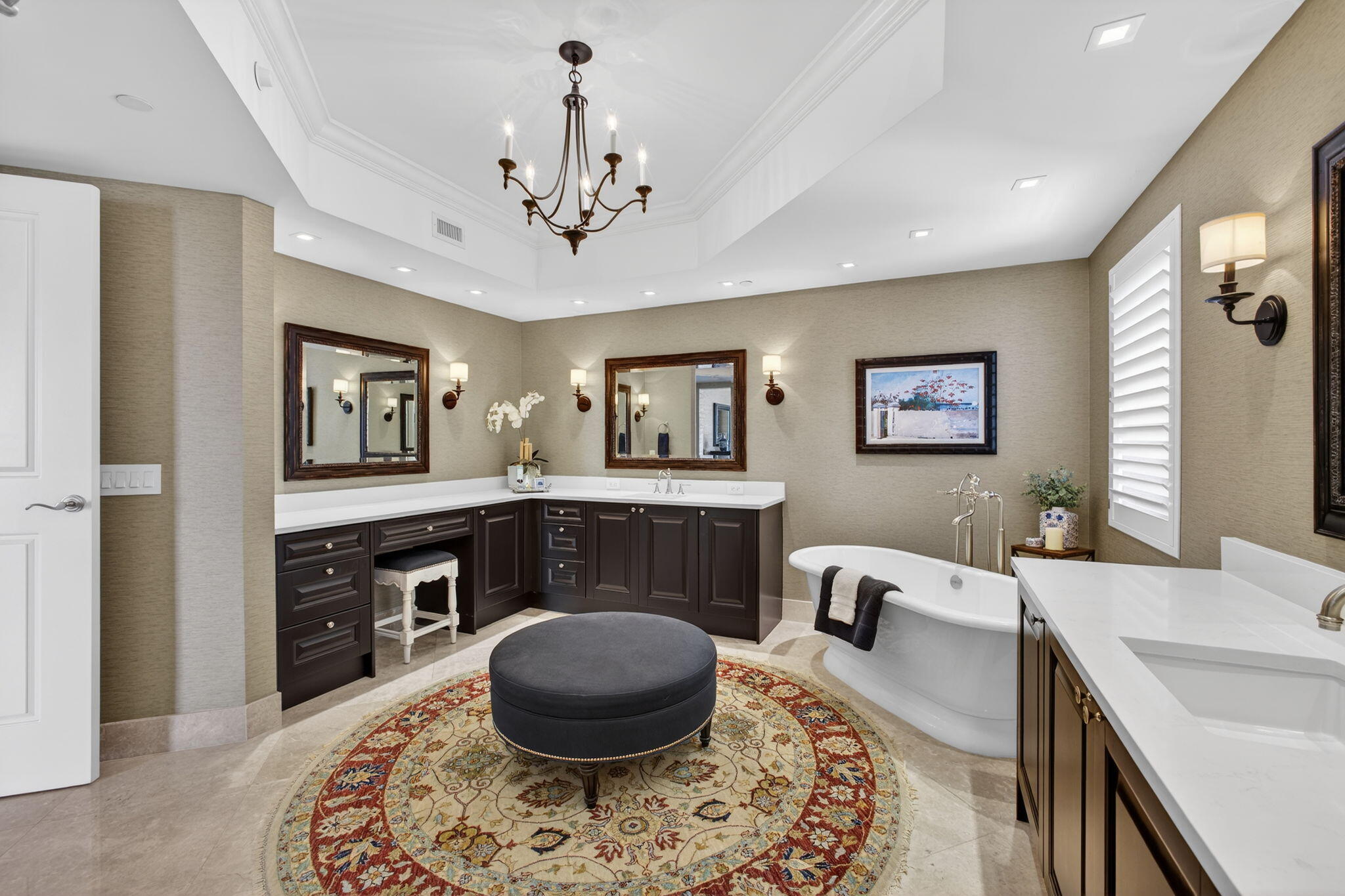 2700 North Ocean Drive, Unit 1401A Riviera Beach, FL 33404 - Photo 44 of 116 a living room with furniture a bathtub and a chandelier