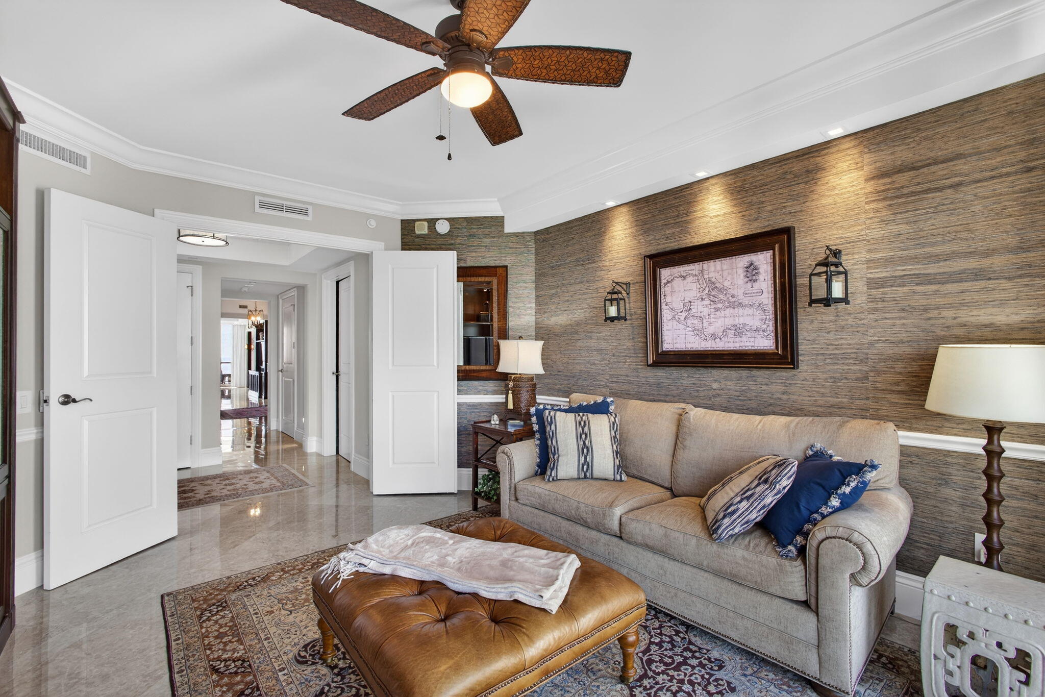 2700 North Ocean Drive, Unit 1401A Riviera Beach, FL 33404 - Photo 65 of 116 a living room with furniture and a ceiling fan