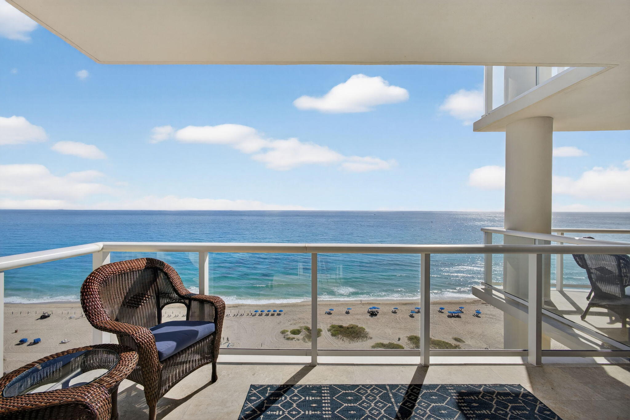 2700 North Ocean Drive, Unit 1401A Riviera Beach, FL 33404 - Photo 69 of 116 a view of a chairs and table in a balcony
