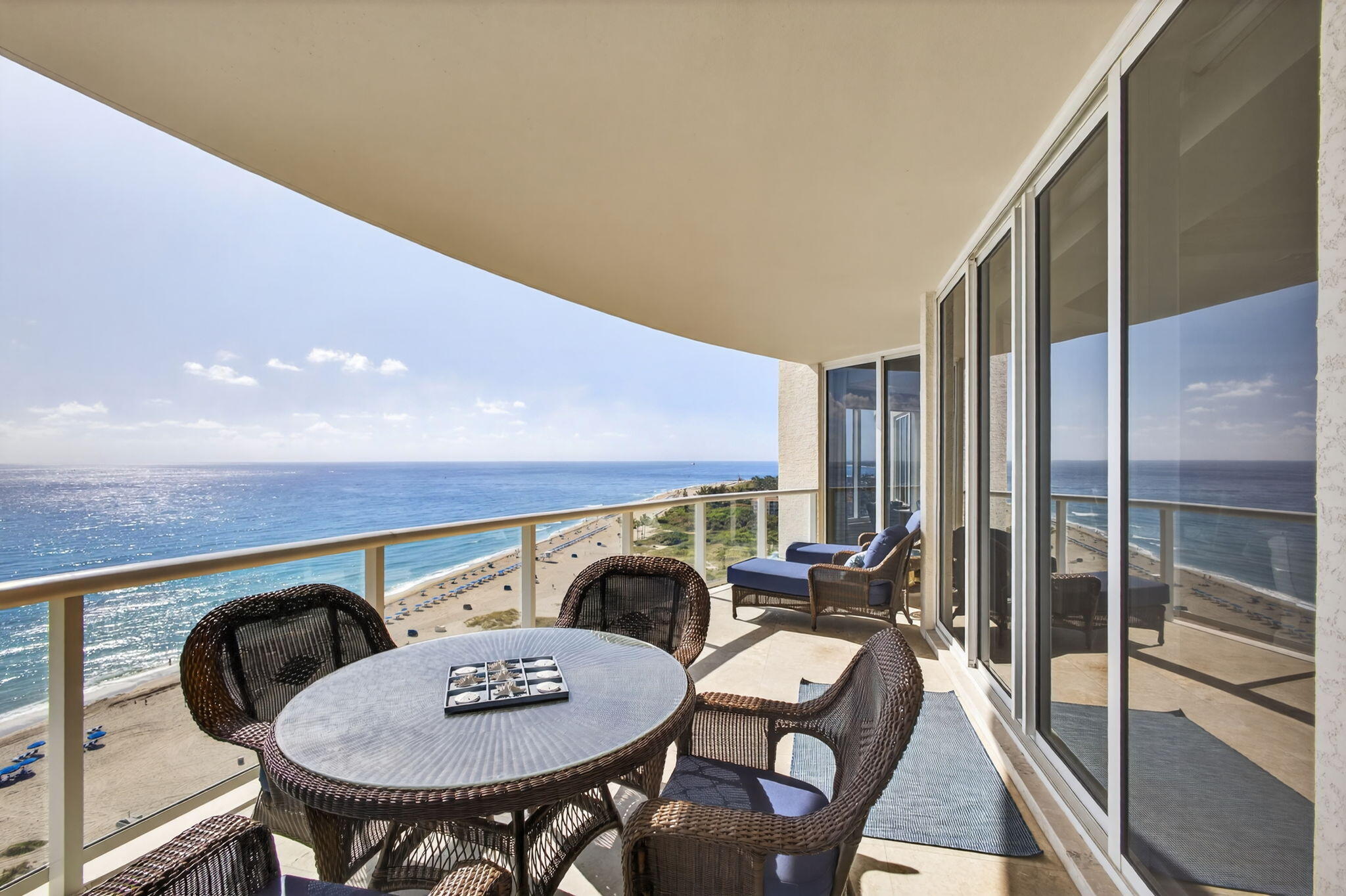 2700 North Ocean Drive, Unit 1401A Riviera Beach, FL 33404 - Photo 73 of 116 a view of a dining room with furniture and wooden floor