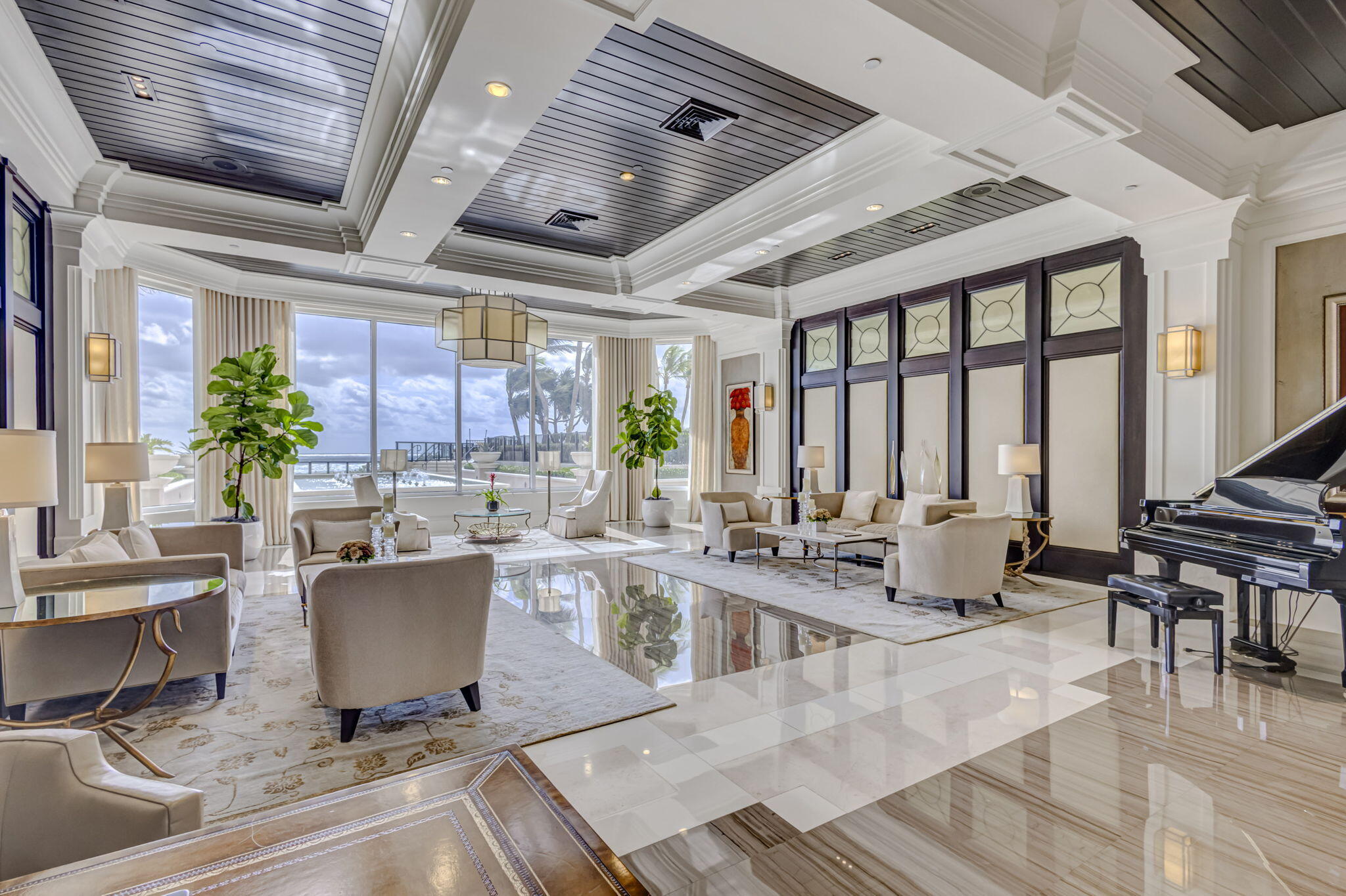 2700 North Ocean Drive, Unit 1401A Riviera Beach, FL 33404 - Photo 85 of 116 a living room with lots of furniture and a large window