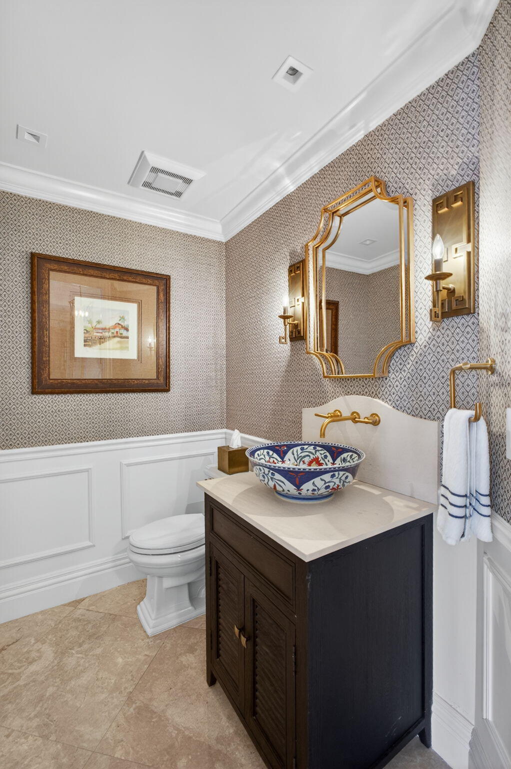 2700 North Ocean Drive, Unit 1401A Riviera Beach, FL 33404 - Photo 9 of 116 a bathroom with a sink vanity mirror and toilet