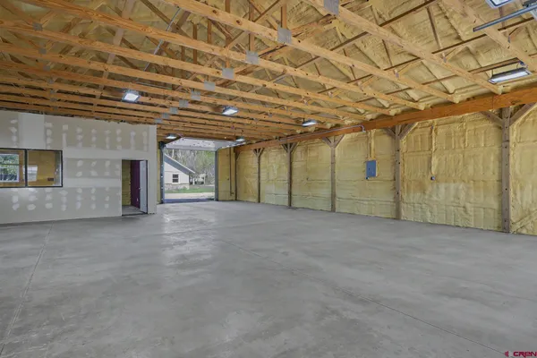 an empty room with chandelier