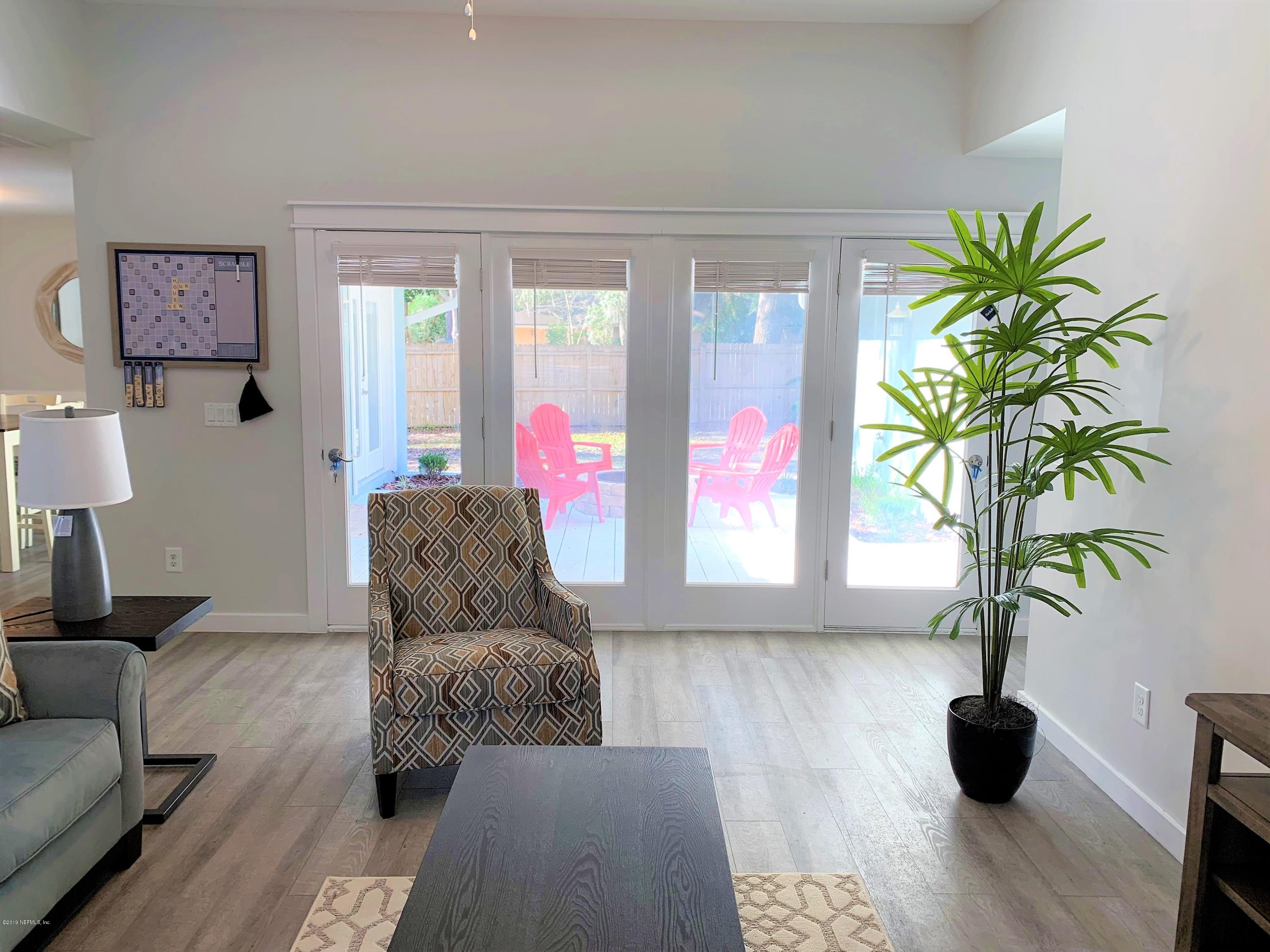 3300 Turtle Creek Road St. Augustine, FL 32086 - Photo 12 of 35 a living room with furniture and a potted plant