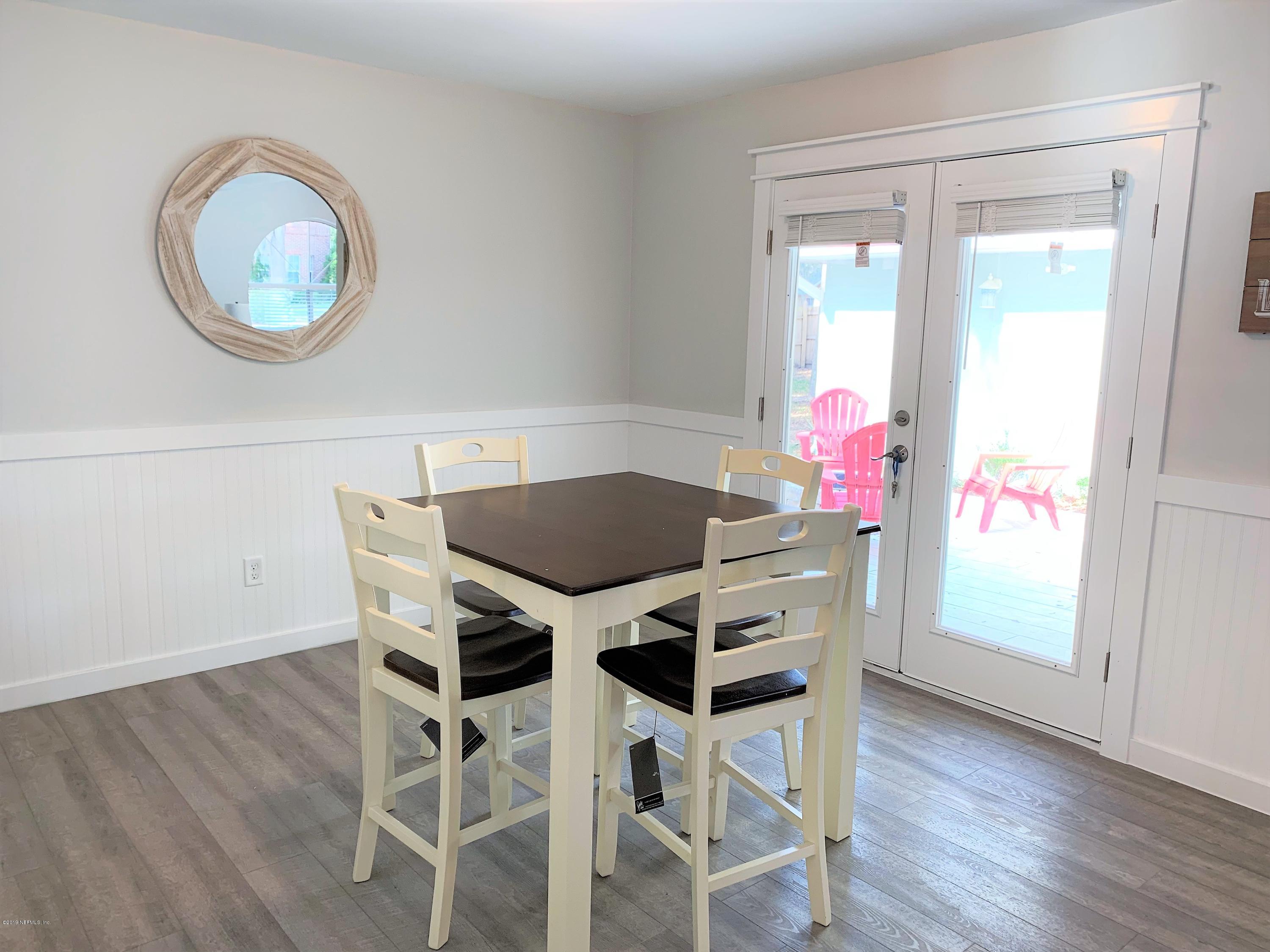 3300 Turtle Creek Road St. Augustine, FL 32086 - Photo 17 of 35 a view of a dining room with furniture and wooden floor
