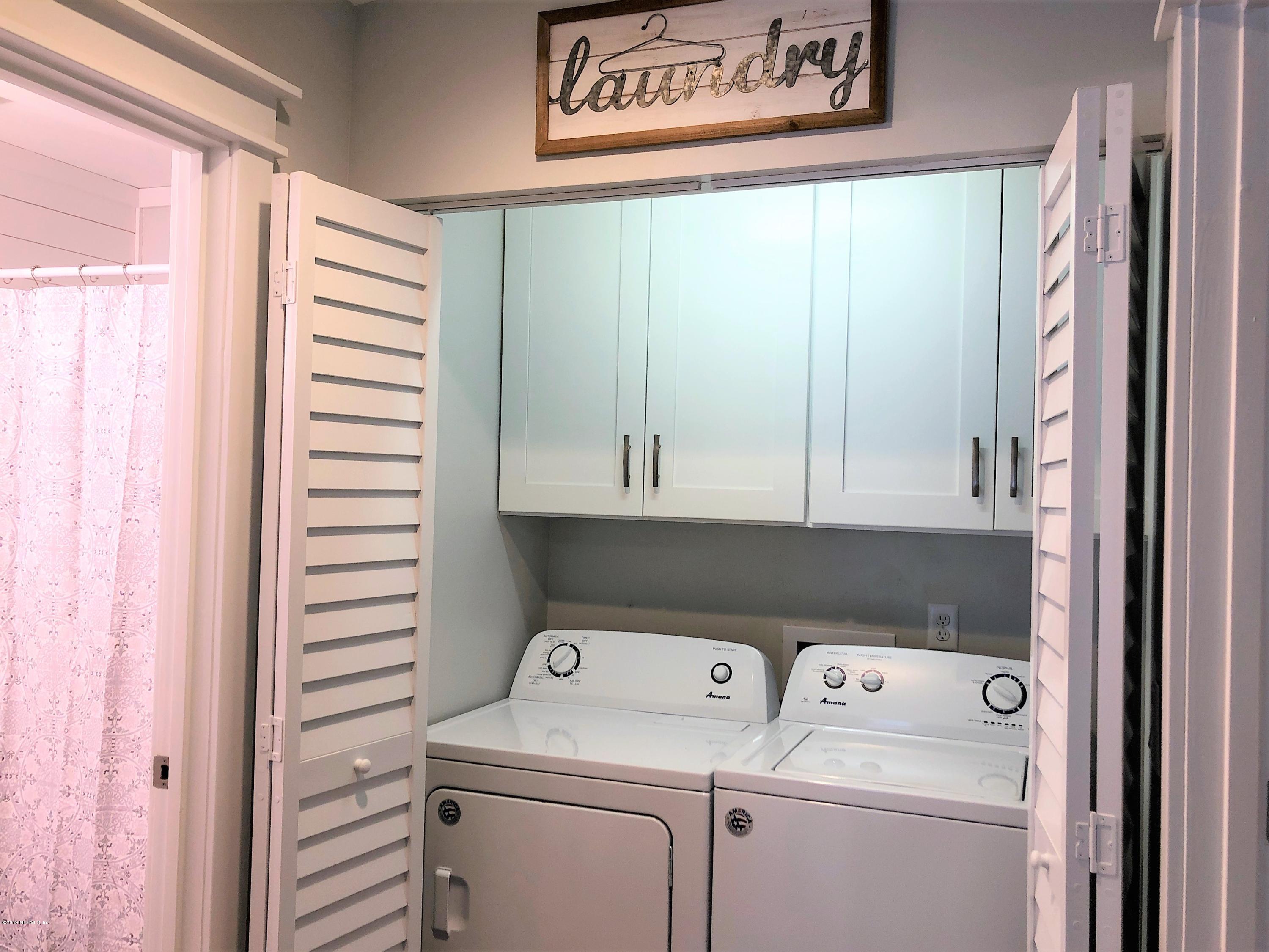 3300 Turtle Creek Road St. Augustine, FL 32086 - Photo 22 of 35 a view of bathroom with washer and dryer