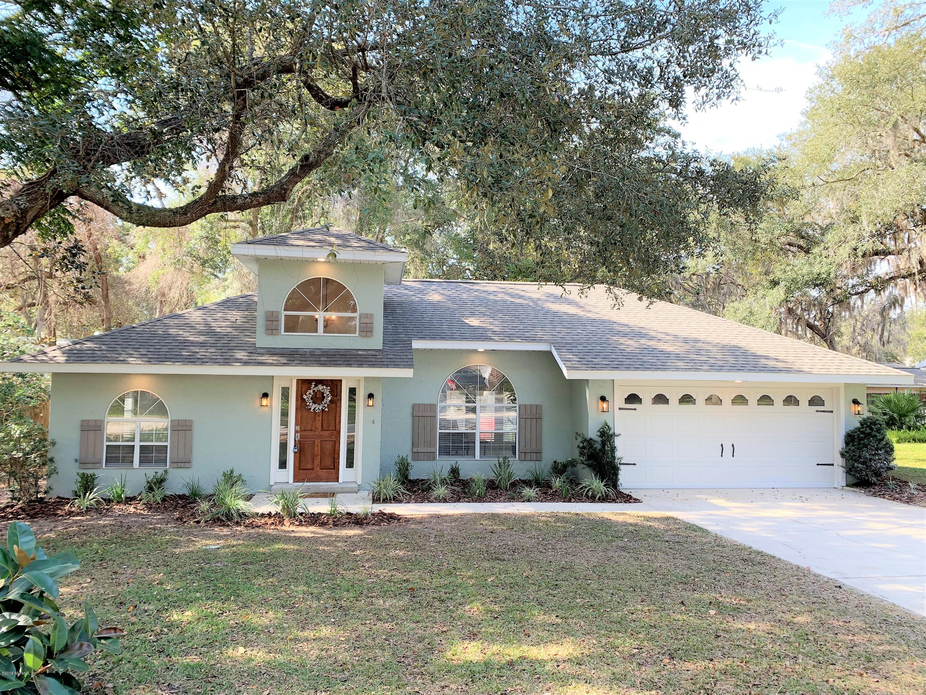 3300 Turtle Creek Road St. Augustine, FL 32086 - Photo 3 of 35 a front view of a house with garden
