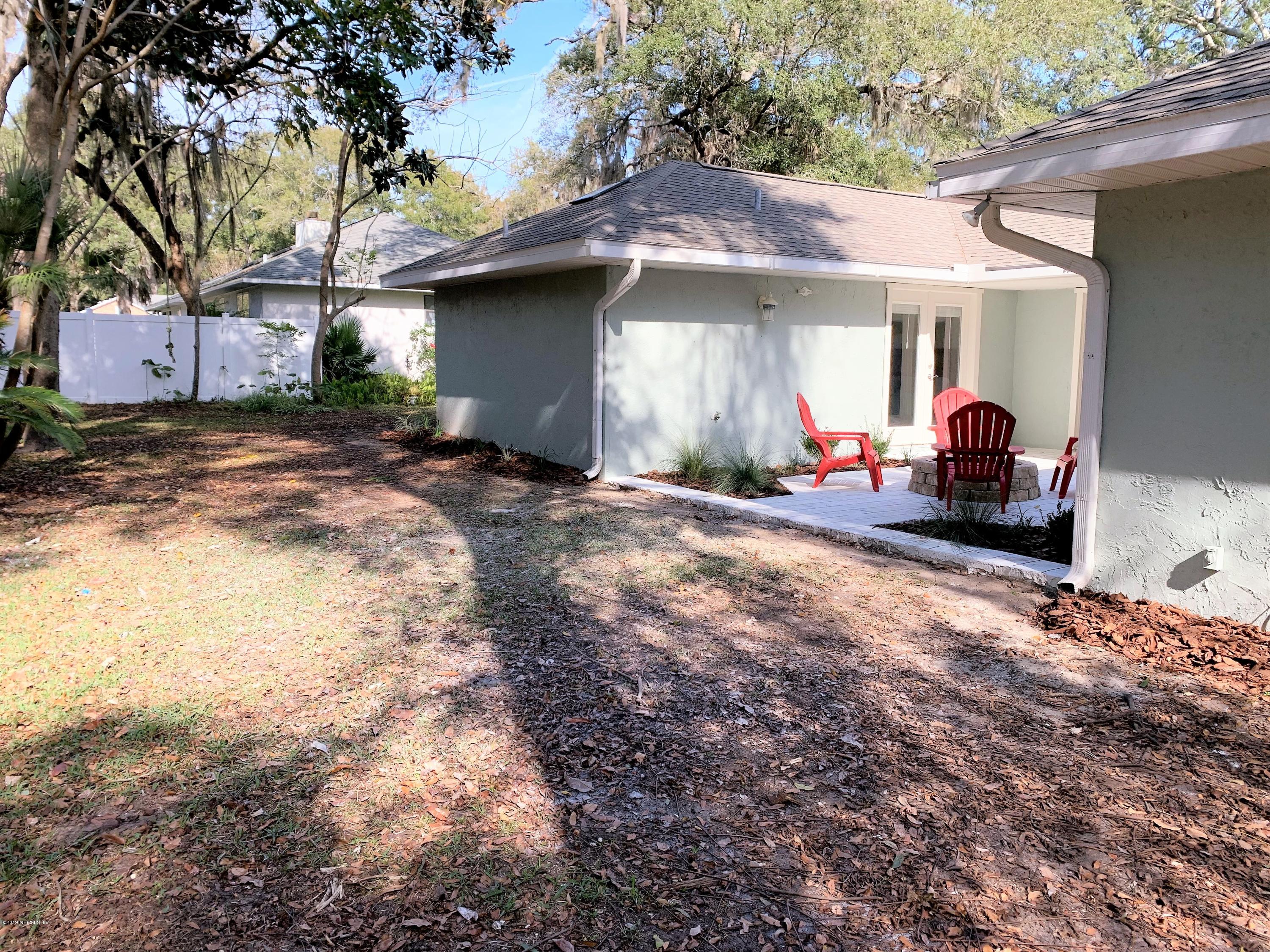 3300 Turtle Creek Road St. Augustine, FL 32086 - Photo 34 of 35 a view of a house with backyard and sitting area