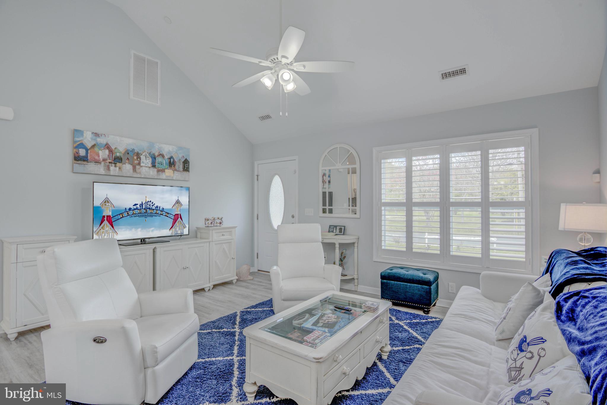 10242 Golf Course Road Ocean City, MD 21842 - Photo 3 of 55 Living room view to front door