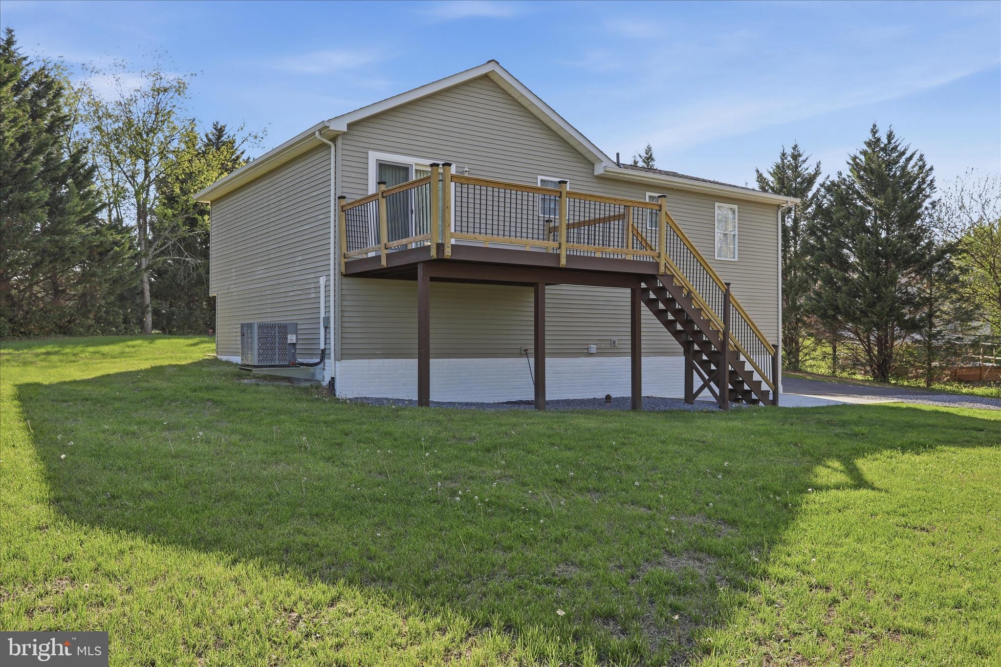 174 Open Field Lane Falling Waters, WV 25419 - Photo 35 of 56 Deck w/ slider off dining area