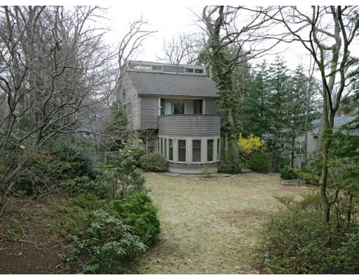 99 Codman Road Brookline, MA 02445 - Photo 8 of 8 front view of a house with a yard