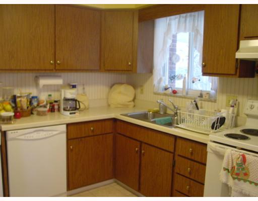 21 Flora Road Baldwin, PA 15227 - Photo 4 of 14 Kitchen. The updated kitchen has just enough counter space and room for a table.