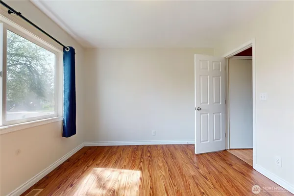 a view of an empty room and window