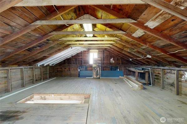 a view of a room with wooden roof
