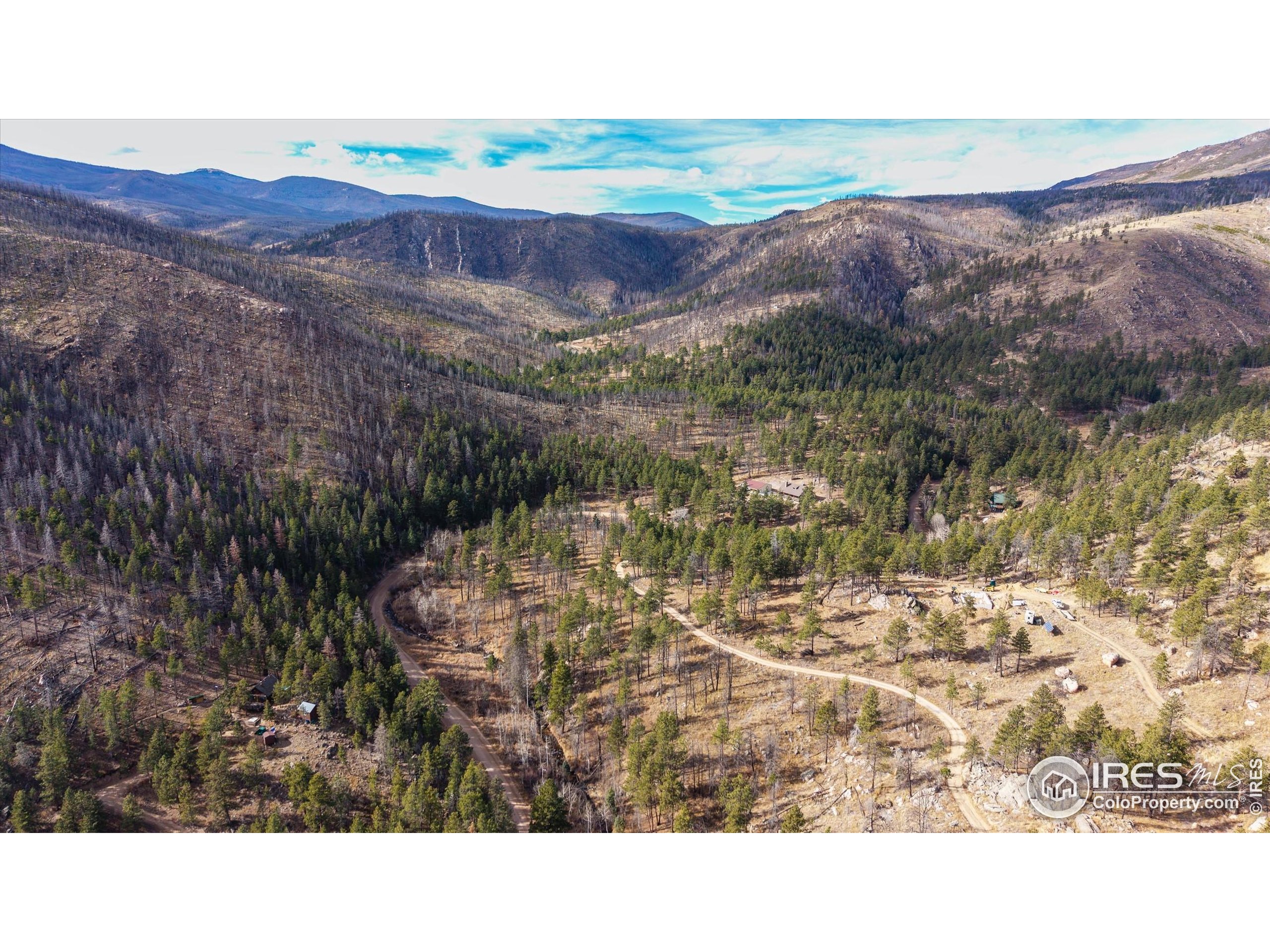 0 Cougar Court Bellvue, CO 80512 - Photo 18 of 32 a black and white photo of a lake