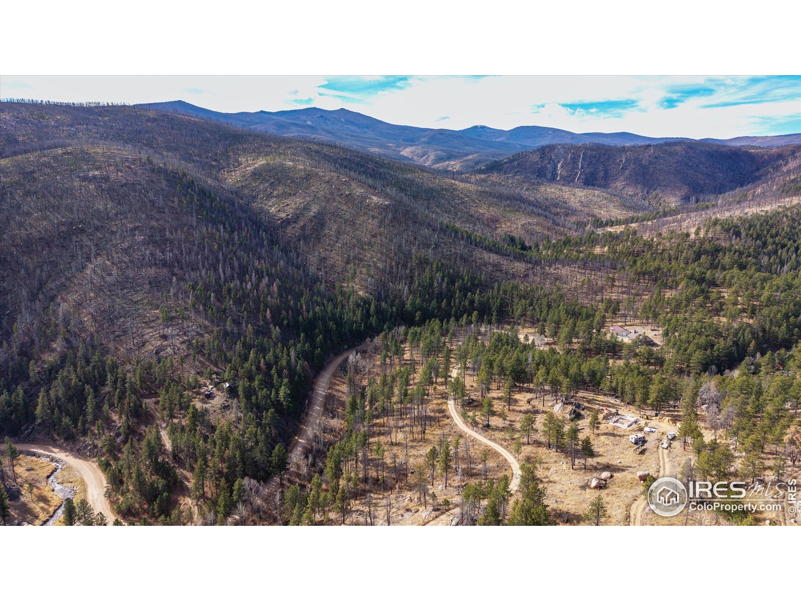 0 Cougar Court Bellvue, CO 80512 - Photo 7 of 32 a black and white photo of a lake