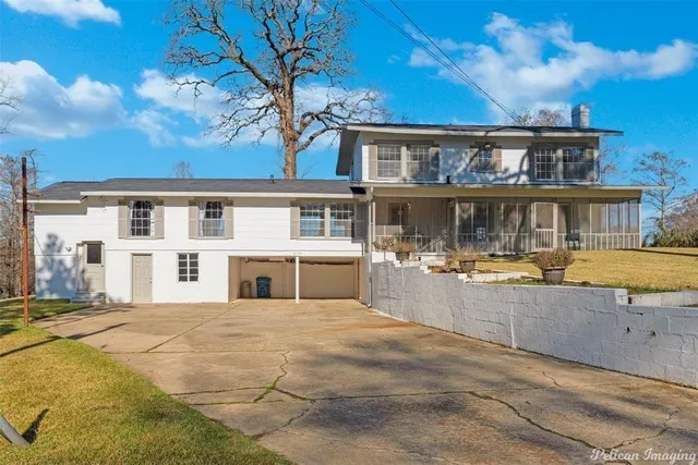 a view of a house with swimming pool