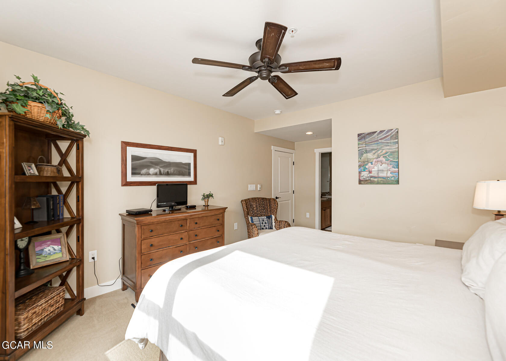 300 Base Camp Circle, Unit 208 Granby, CO 80446 - Photo 18 of 66 a bedroom with a bed and a flat screen tv