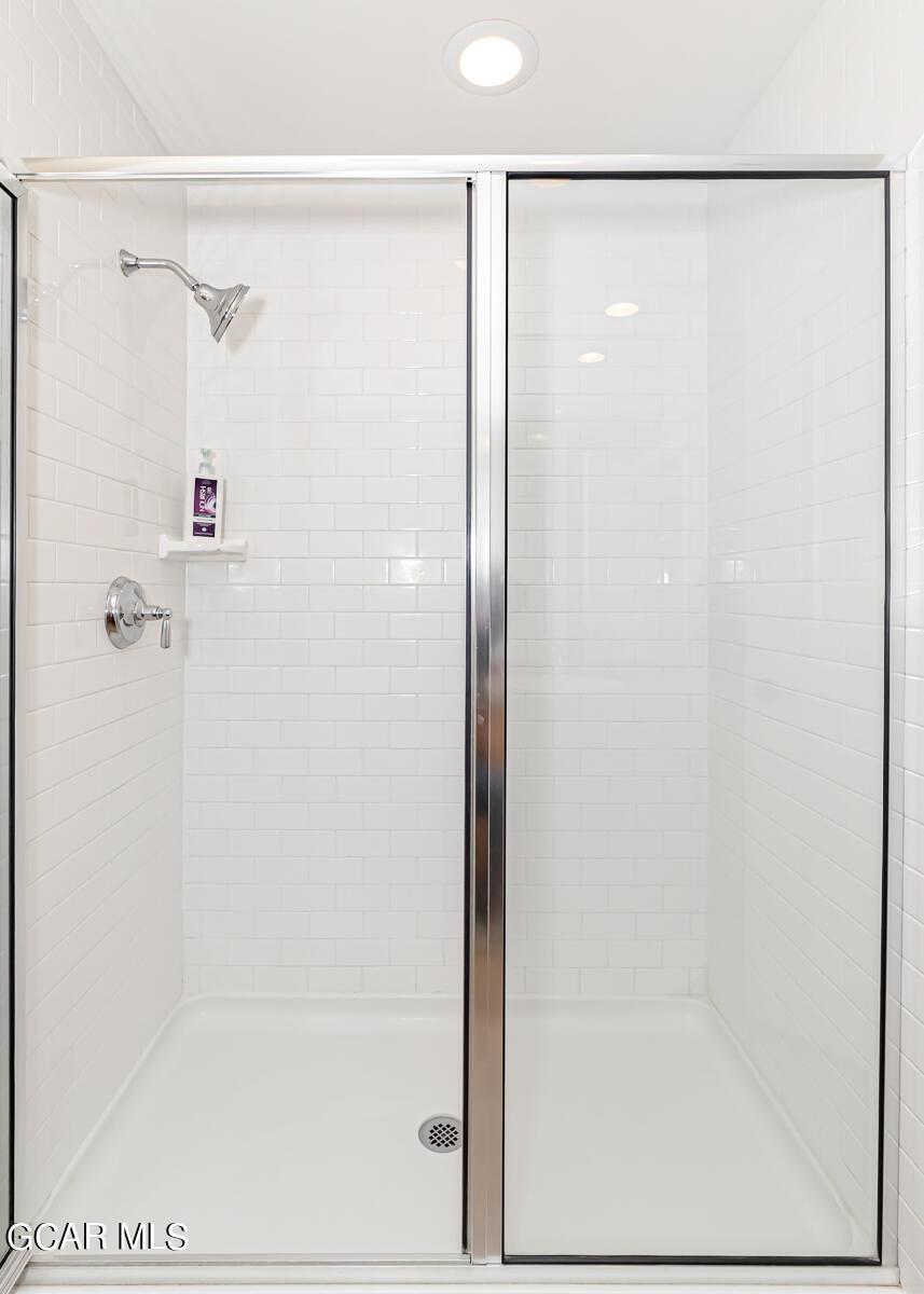 300 Base Camp Circle, Unit 208 Granby, CO 80446 - Photo 27 of 66 a bathroom with a shower