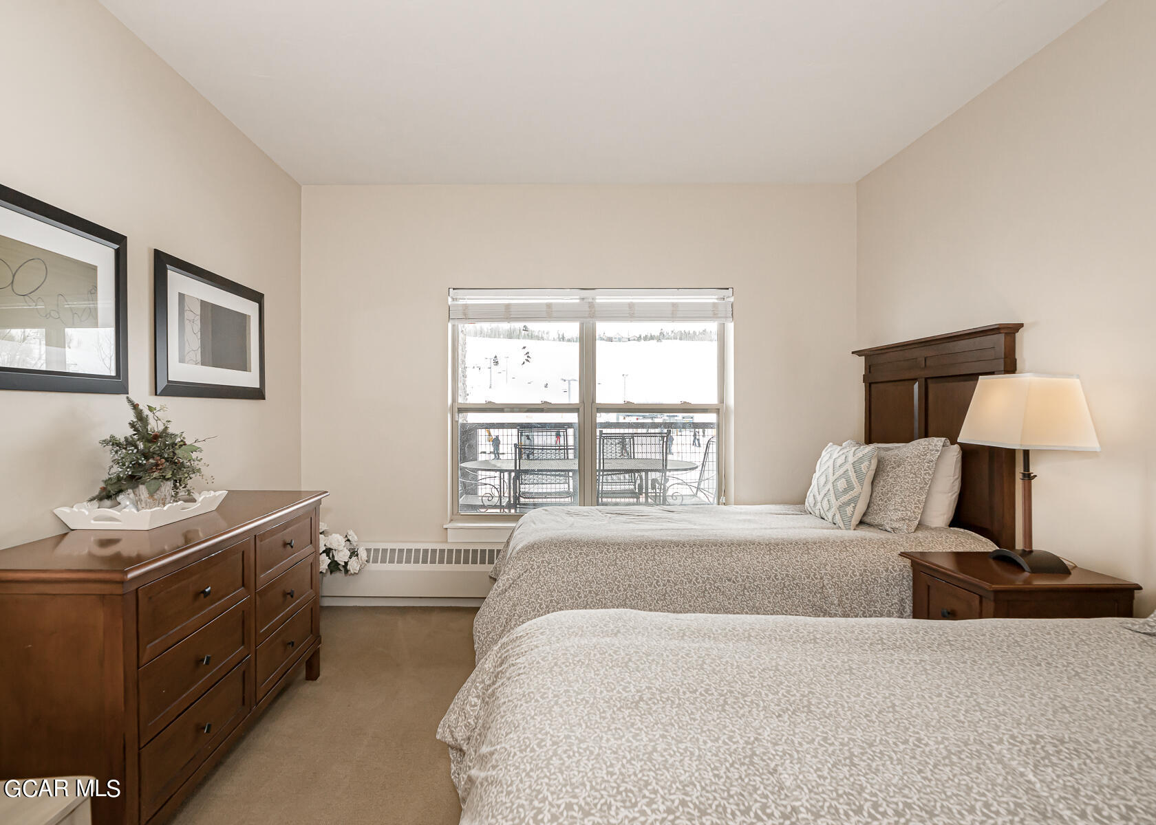 300 Base Camp Circle, Unit 208 Granby, CO 80446 - Photo 31 of 66 a bedroom with a bed and a window