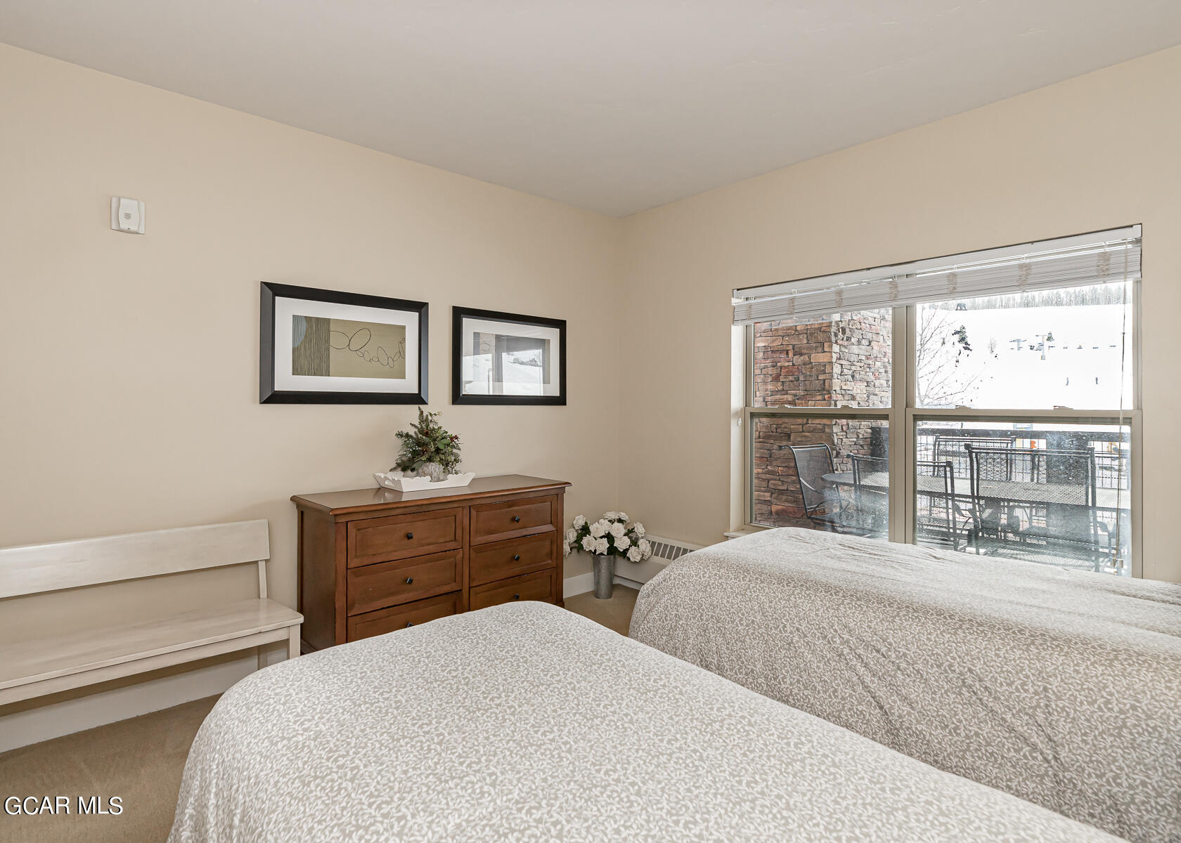 300 Base Camp Circle, Unit 208 Granby, CO 80446 - Photo 32 of 66 a bedroom with a bed and a large window