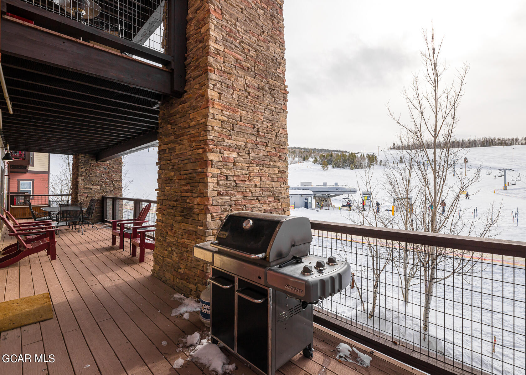 300 Base Camp Circle, Unit 208 Granby, CO 80446 - Photo 39 of 66 a view of balcony and deck with wooden floor