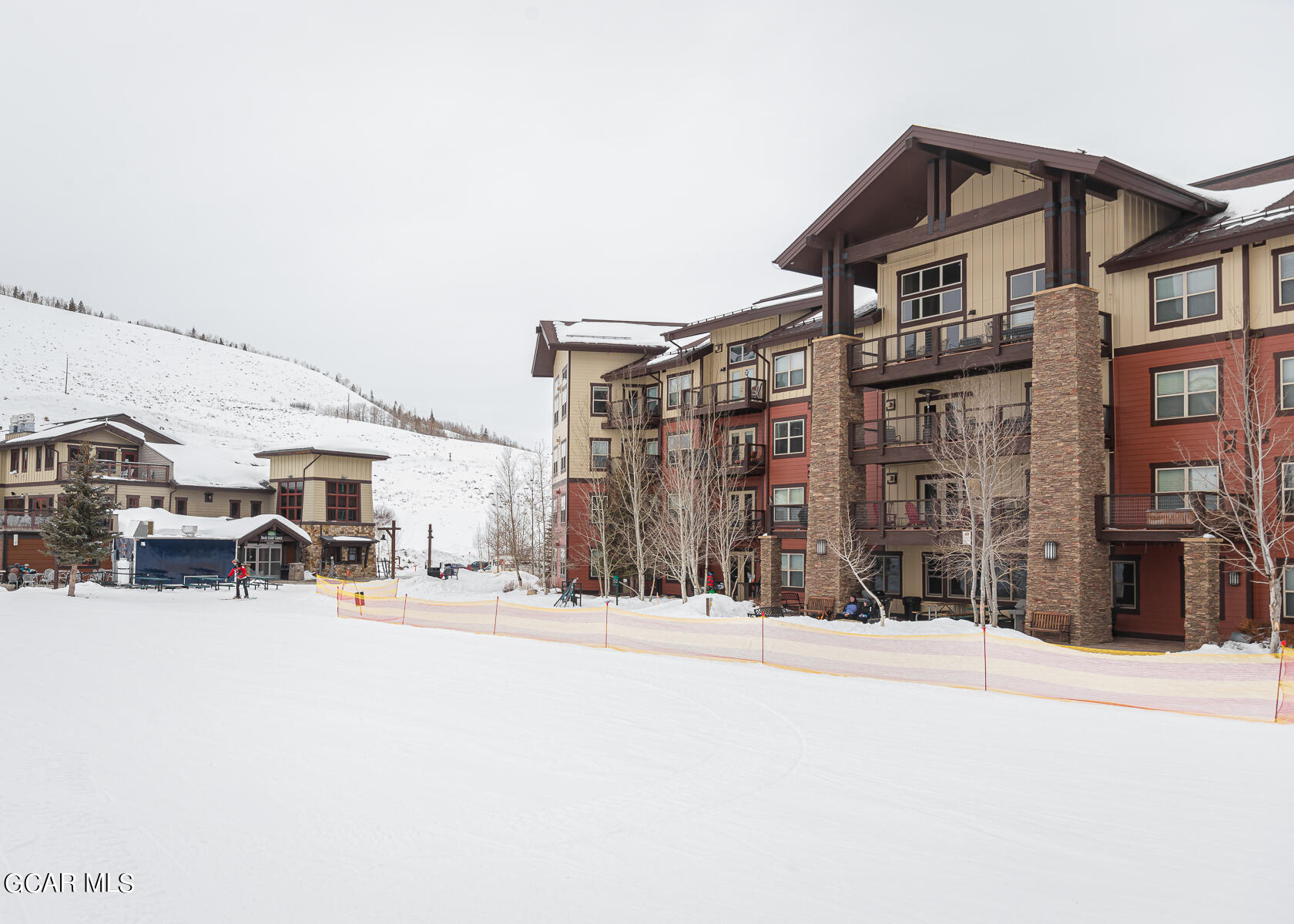 300 Base Camp Circle, Unit 208 Granby, CO 80446 - Photo 51 of 66 a view of a building with cars parked