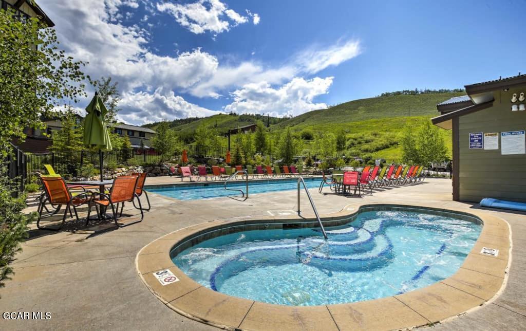 300 Base Camp Circle, Unit 208 Granby, CO 80446 - Photo 61 of 66 a view of a swimming pool with a patio