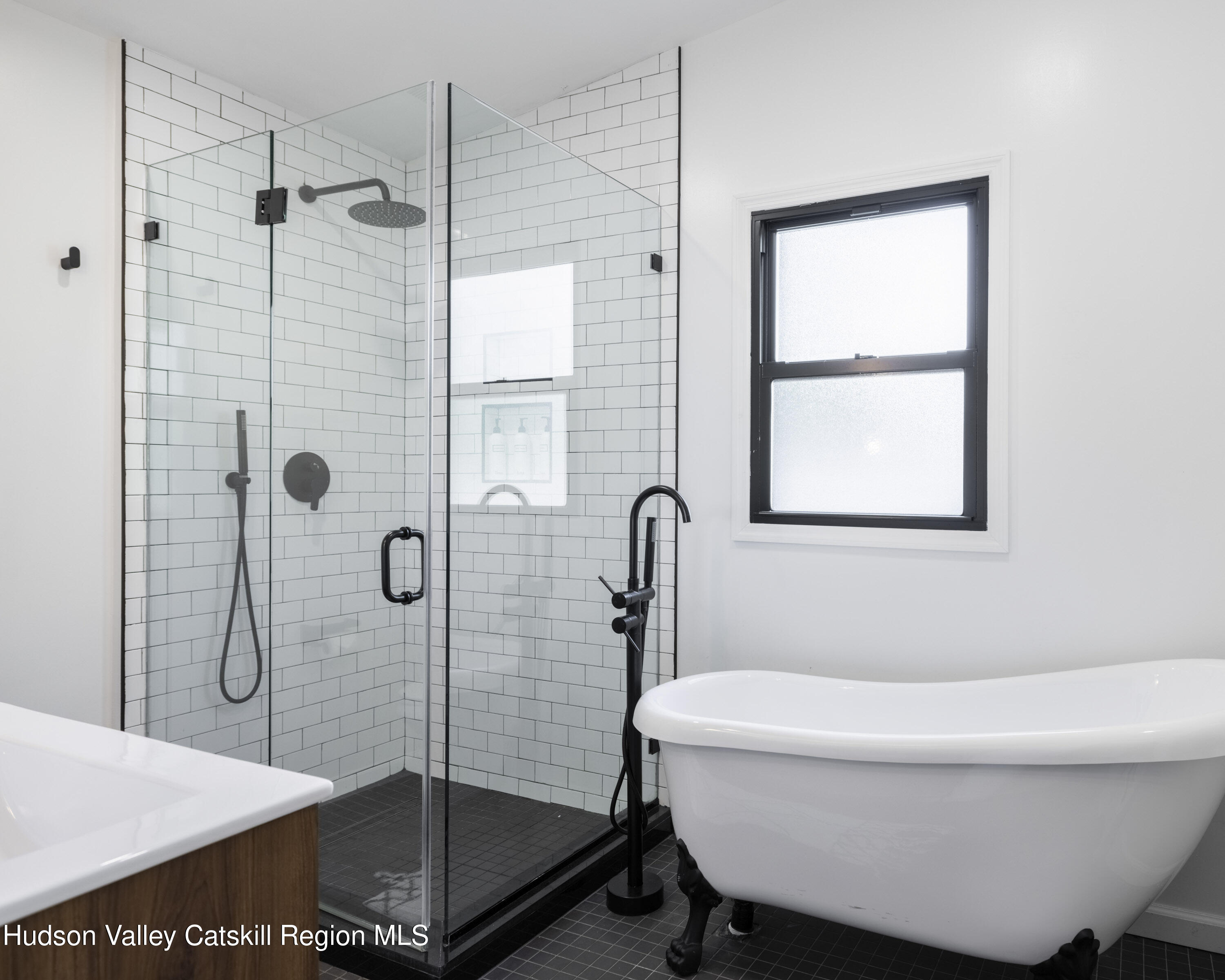 20 Sutton Hollow Road Windham, NY 12496 - Photo 13 of 30 a bathroom with a sink toilet and shower