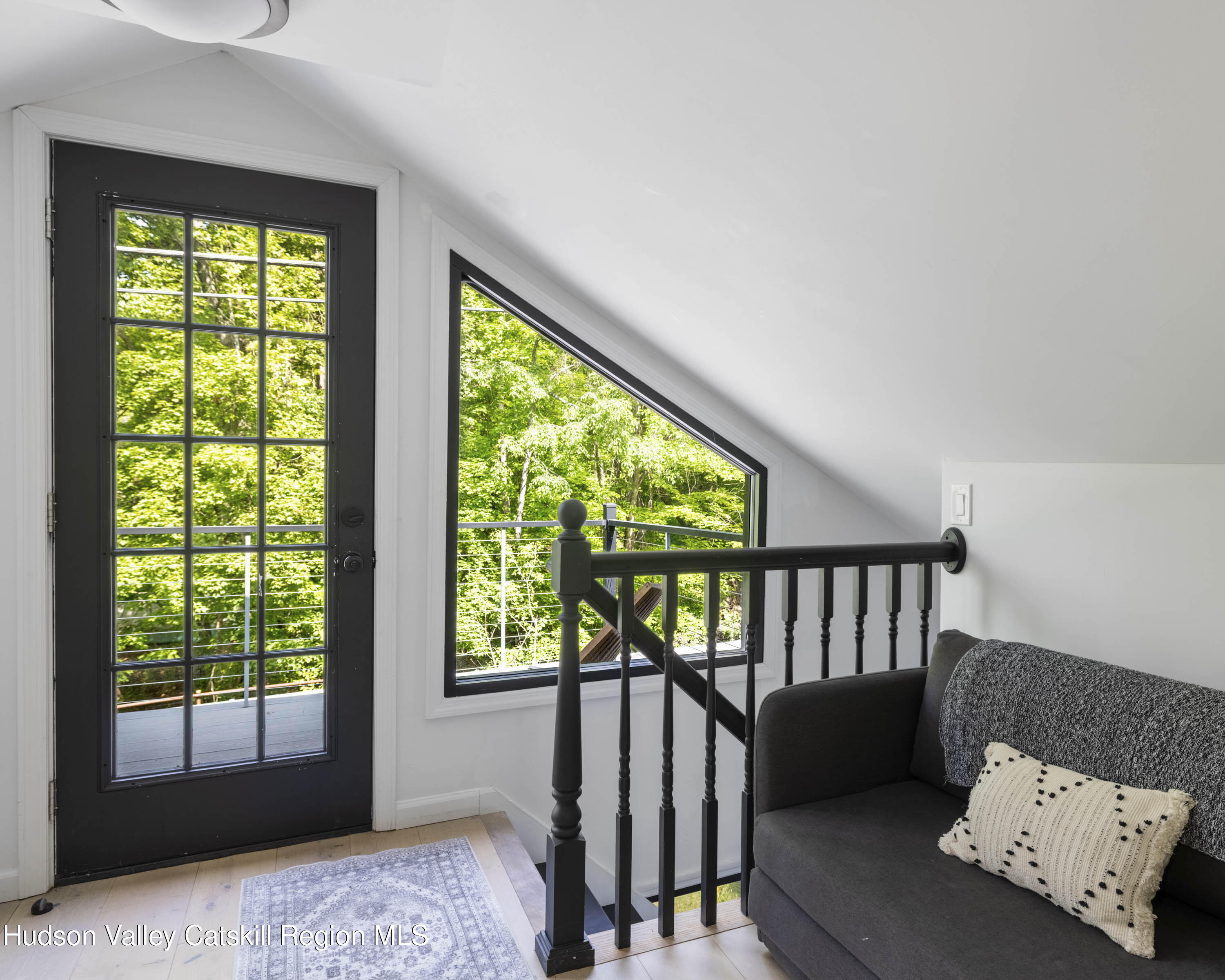 20 Sutton Hollow Road Windham, NY 12496 - Photo 17 of 30 a view of a bedroom with furniture and a window