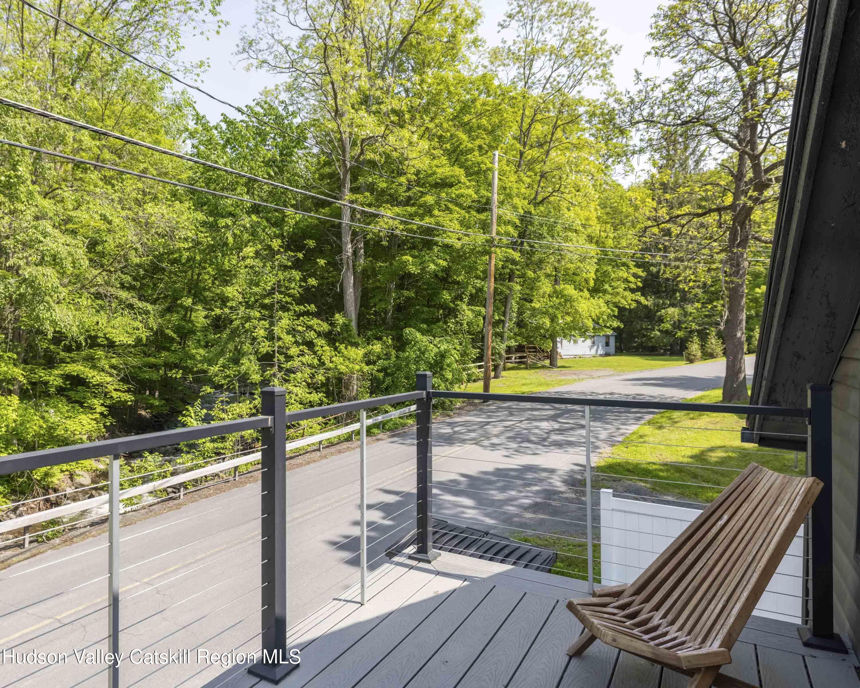 20 Sutton Hollow Road Windham, NY 12496 - Photo 20 of 30 a view of a balcony with chairs