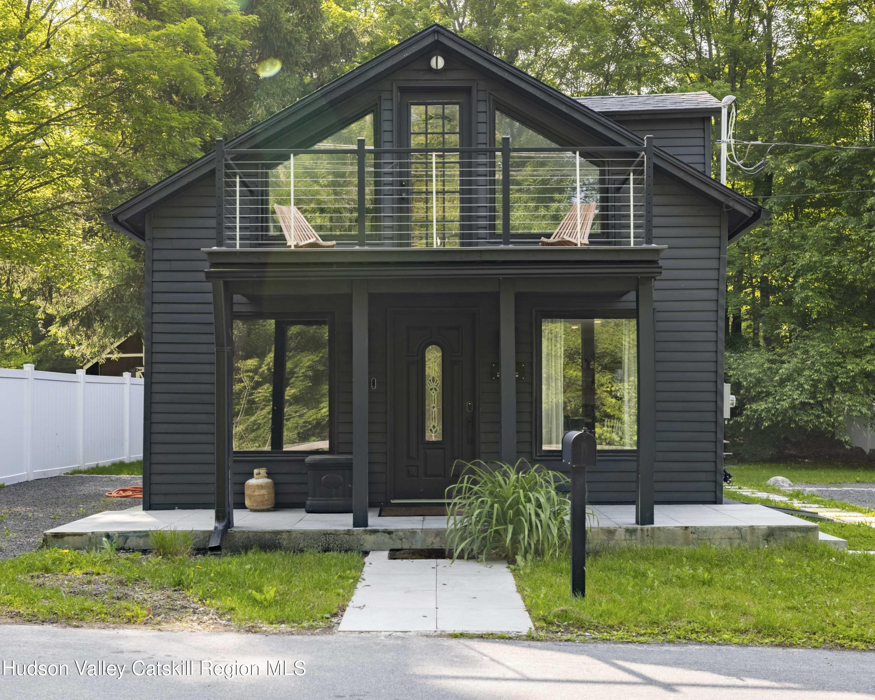 20 Sutton Hollow Road Windham, NY 12496 - Photo 2 of 30 a front view of a house with a yard