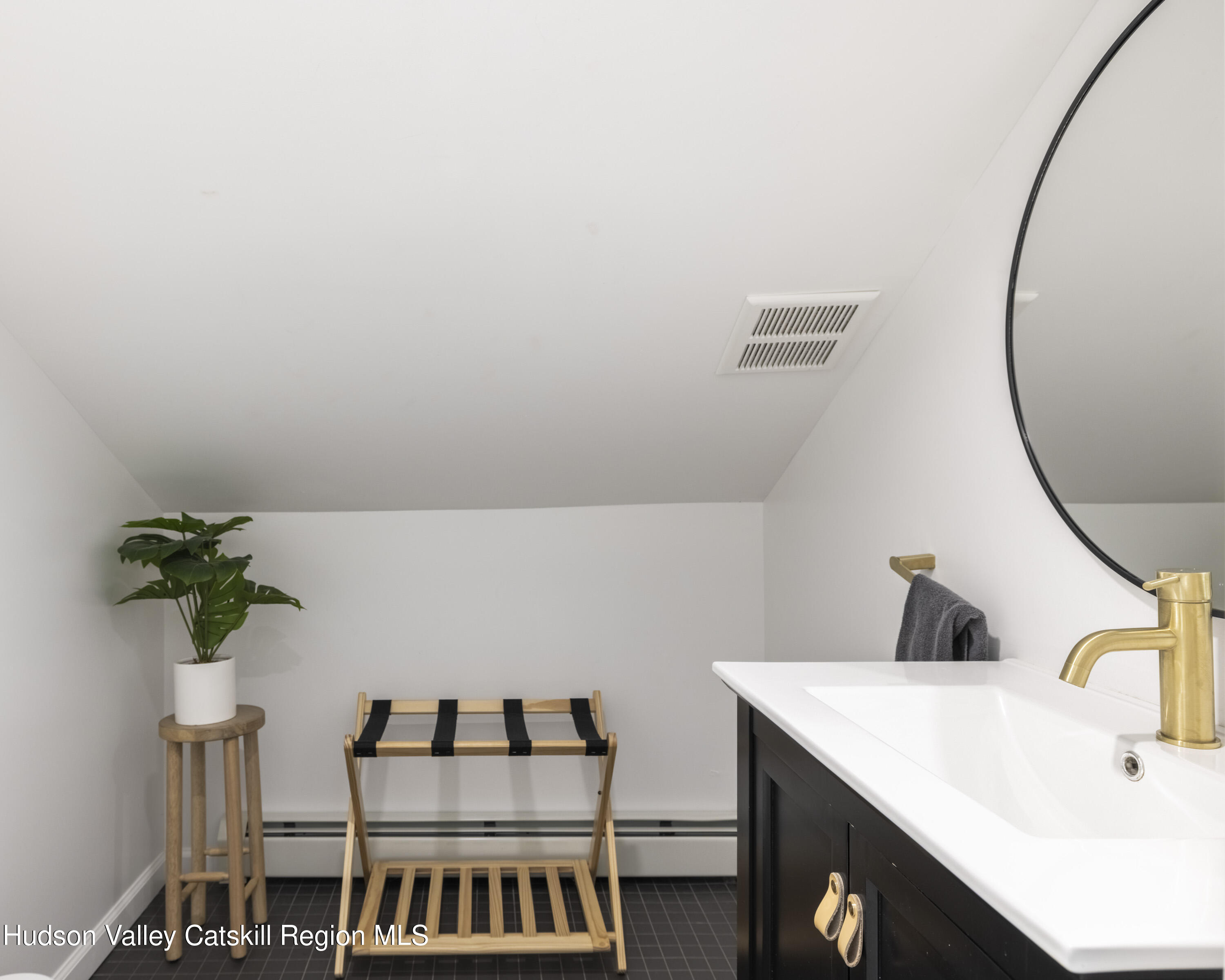 20 Sutton Hollow Road Windham, NY 12496 - Photo 24 of 30 a table with potted plant in front of it