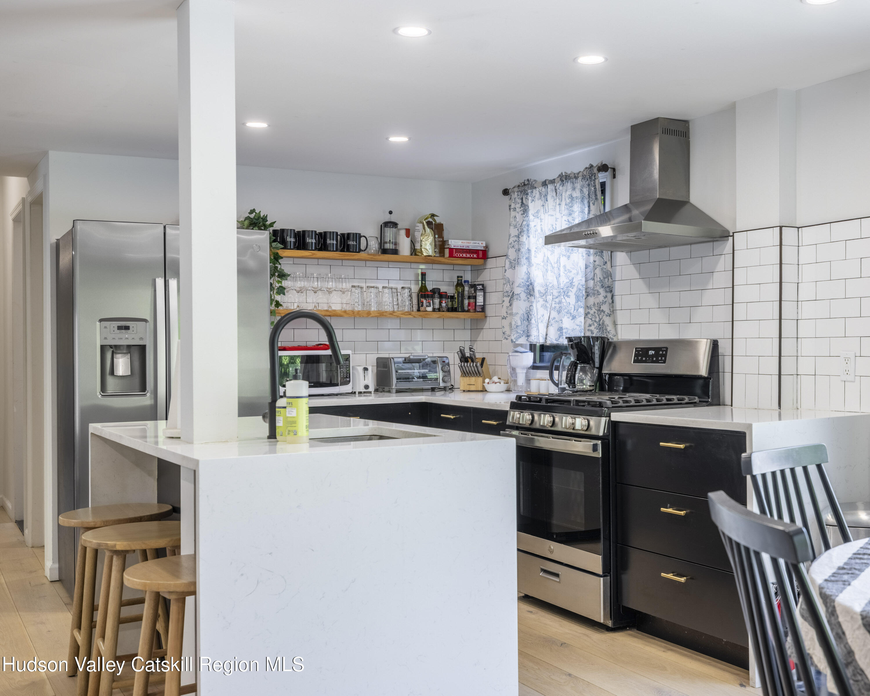 20 Sutton Hollow Road Windham, NY 12496 - Photo 6 of 30 a kitchen with stainless steel appliances granite countertop a sink stove and refrigerator