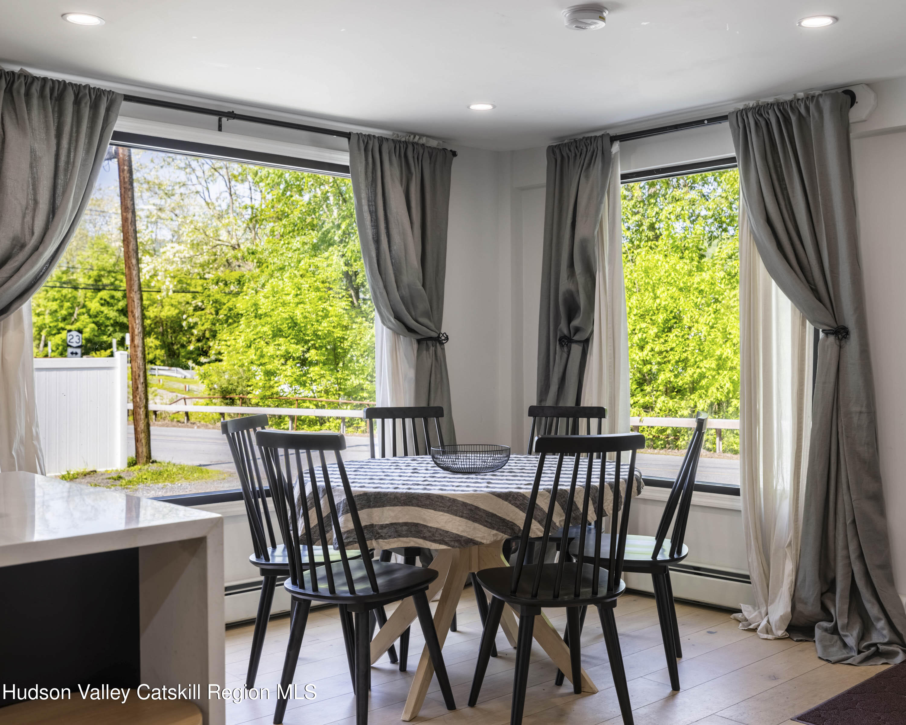 20 Sutton Hollow Road Windham, NY 12496 - Photo 10 of 30 a view of a dining room with furniture window and outside view