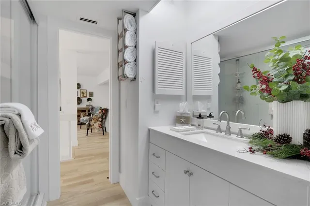 a bedroom with a bed and a cabinets