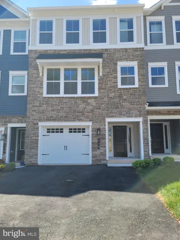 a view of a building with a yard