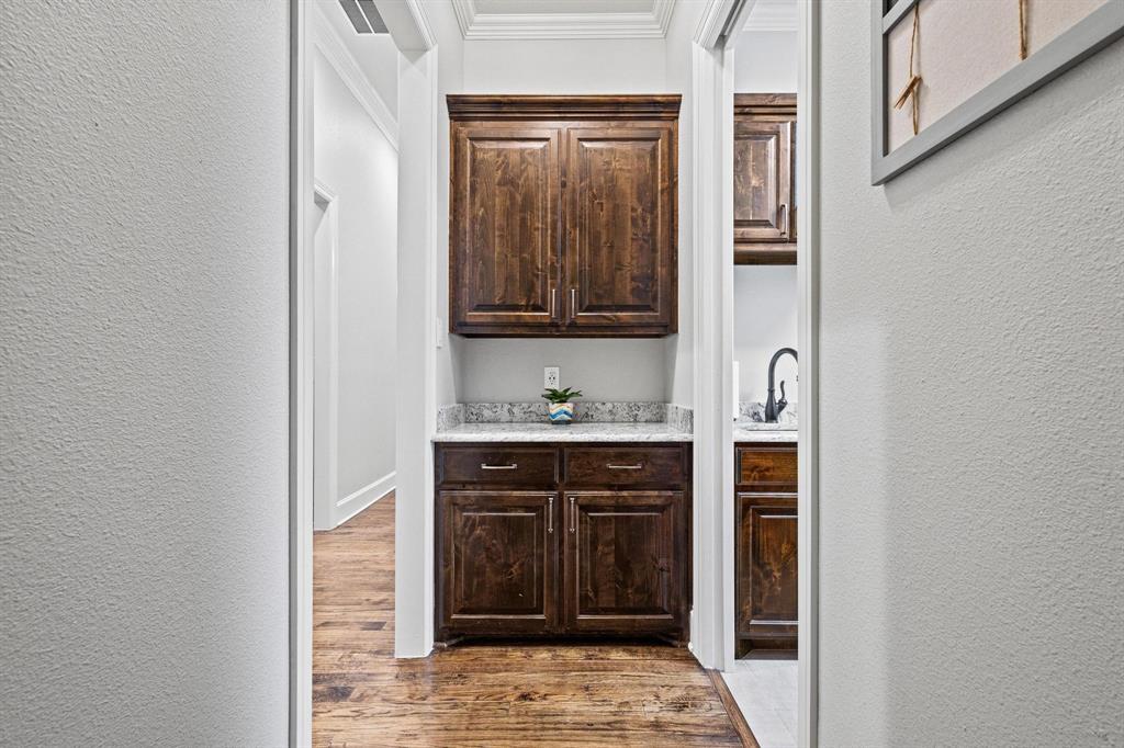 57 Arboretum Denison, TX 75020 - Photo 14 of 40 a bathroom with a sink and a mirror