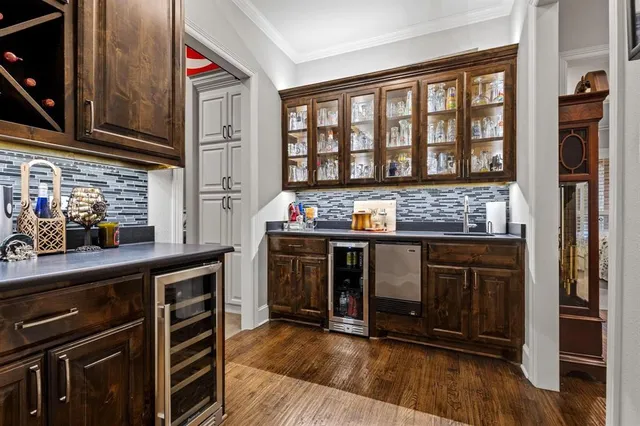 a kitchen with stainless steel appliances a stove and a refrigerator
