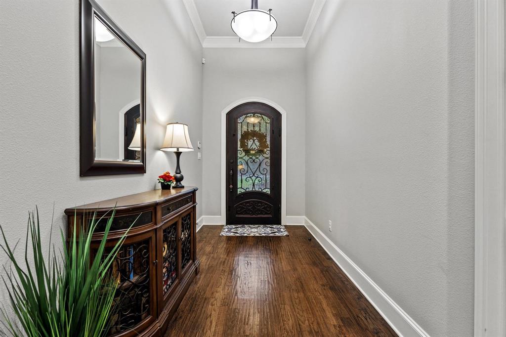 57 Arboretum Denison, TX 75020 - Photo 5 of 40 a view of front door with wooden floor