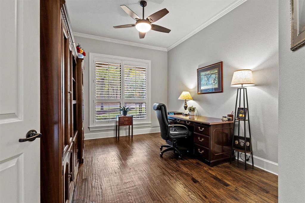57 Arboretum Denison, TX 75020 - Photo 6 of 40 a workspace with wooden floor